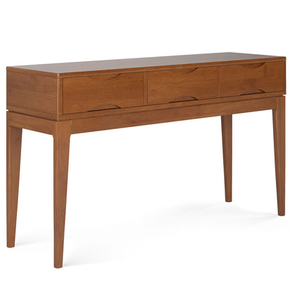 The Harper Handcrafted Console Sofa Table features a mid-century modern design with three drawers, clean lines, tapered legs, and a warm brown finish.