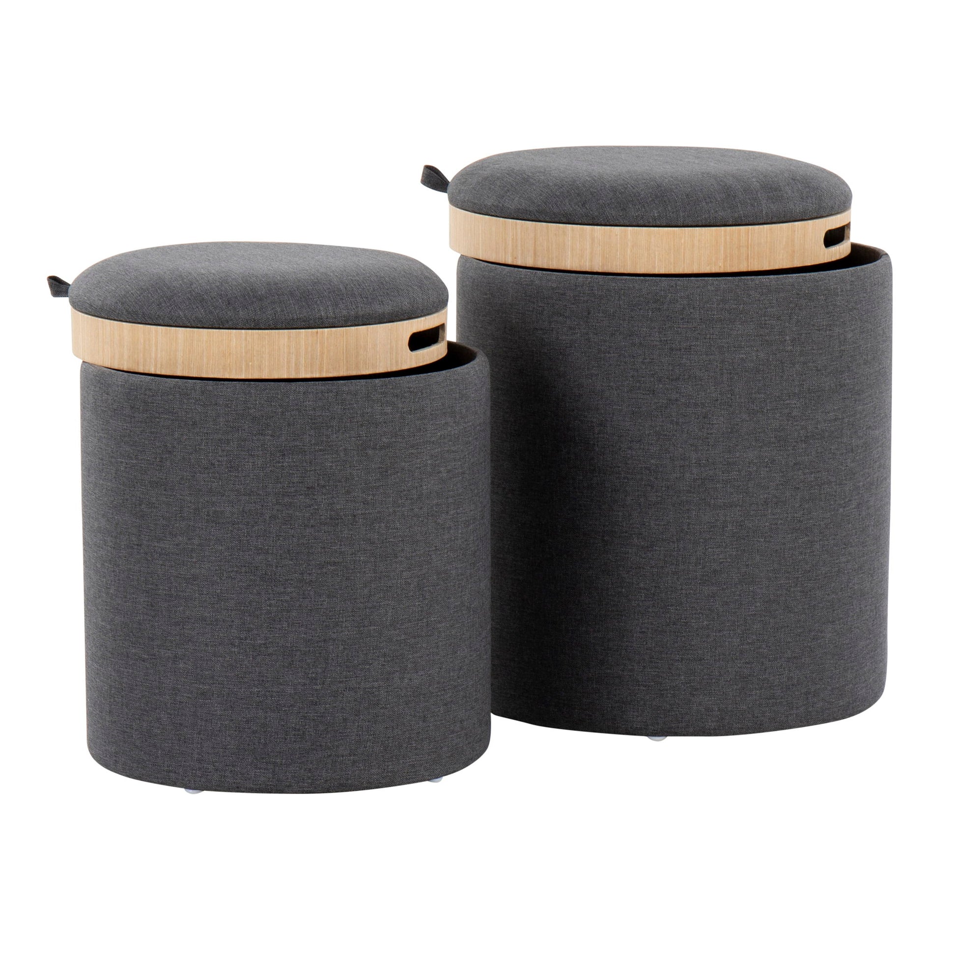 The Tray - Contemporary Nesting Ottoman Set features two modern, cylindrical dark gray fabric ottomans in different sizes. Each has a light wood removable lid with small handles for easy lifting and convenient storage.