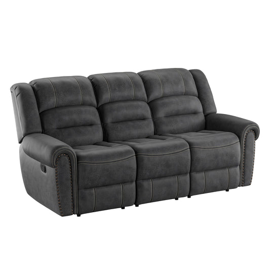 The Ferrar Reclining Sofa in gray is a three-seater with plush, padded cushions and nailhead trim on the armrests, featuring visible stitching and a modern, comfortable design.