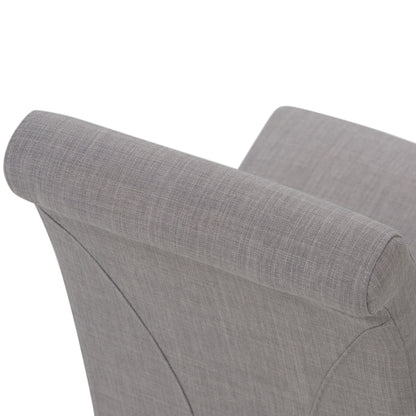 Close-up of the Avalon - Deluxe Parson Dining Chair (Set of 2) shows its gently curved headrest and upper back, upholstered in light gray fabric with smooth stitching for a modern look.