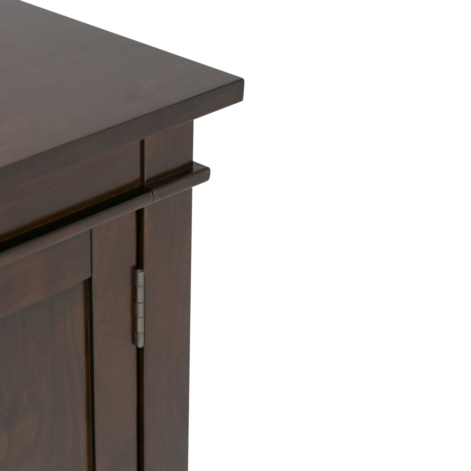 Close-up of the upper corner of the Carlton - TV Media Stand, highlighting the dark wood finish, side panel, door hinge, and smooth top surface.