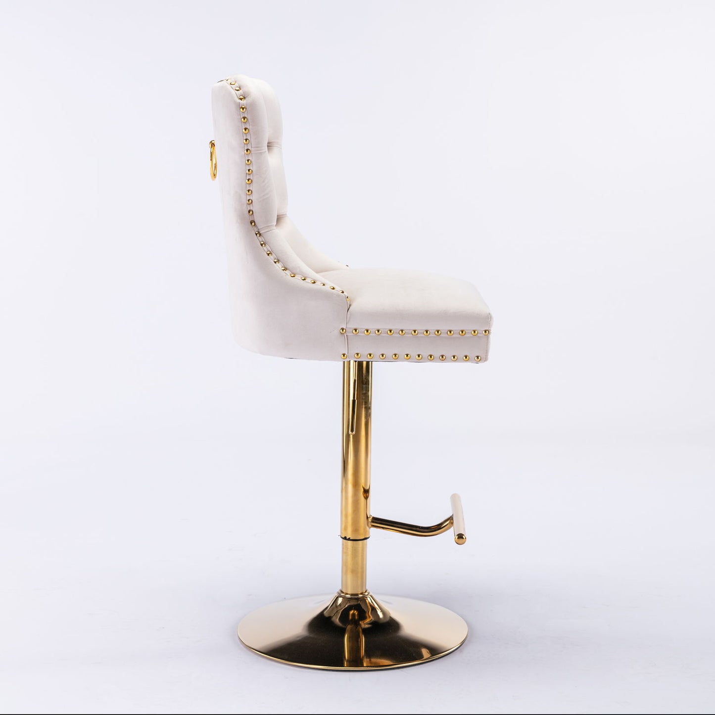 A set of two Thick Golden Swivel Velvet Barstools, featuring white tufted seats and backs, gold stud accents, a gold base and footrest, adjustable seat height (25-33"), shown from the side against a plain white background.