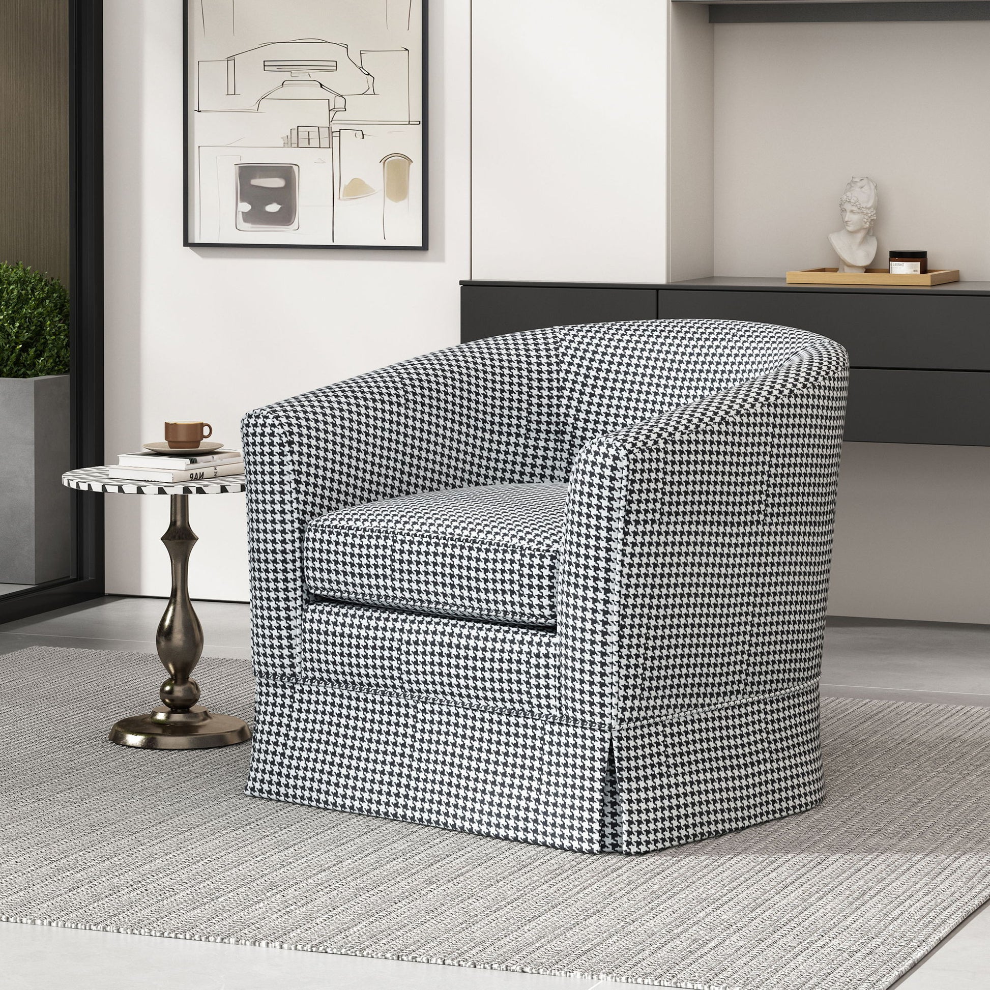 A modern living room featuring the Zeniqua Upholstered Velvet Swivel Chair with loose cover, a round side table with a coffee cup and saucer, minimalist decor, a gray rug, and wall art.