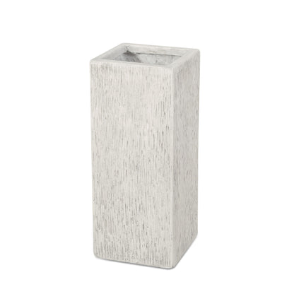 The Modern Outdoor Planter is a tall, rectangular, light gray concrete planter featuring a textured surface and open top, displayed against a white background.