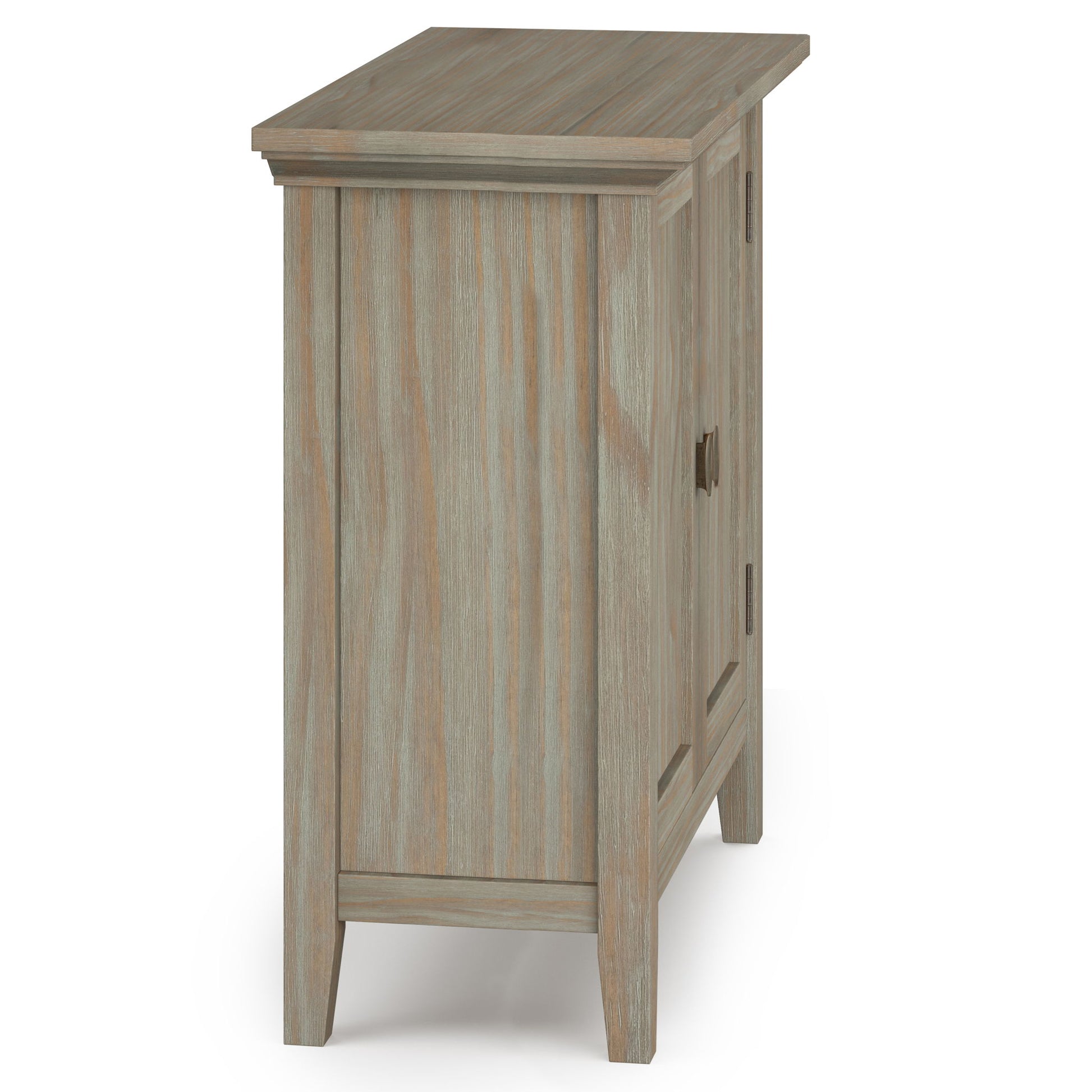 A side view of the Redmond - Handcrafted Low Storage Cabinet in weathered gray, featuring two doors with square handles and tapered legs.