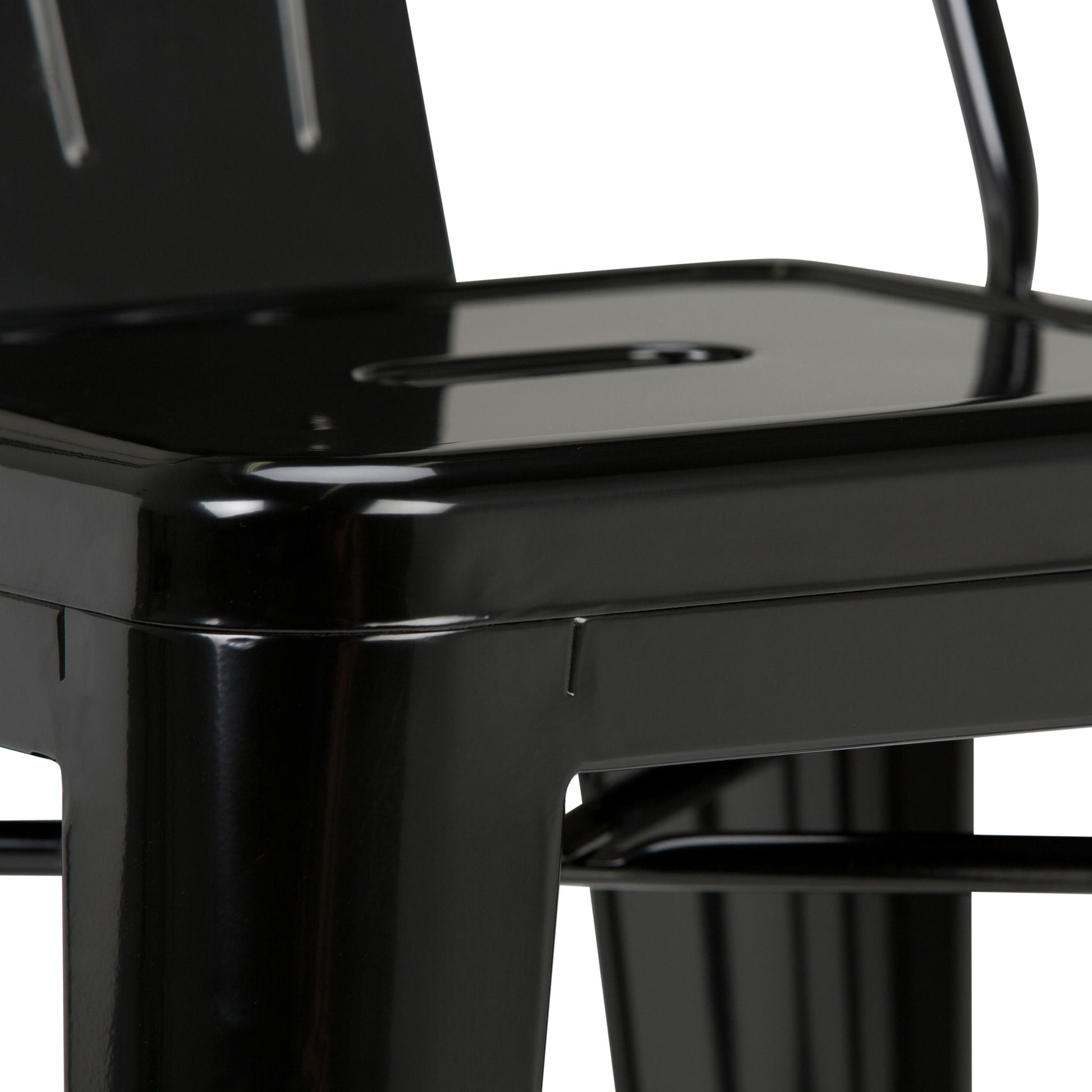 Close-up of the Rayne Multifunctional Metal Stool’s glossy black seat and lower backrest, showcasing its sleek industrial design and clean lines against a white background.