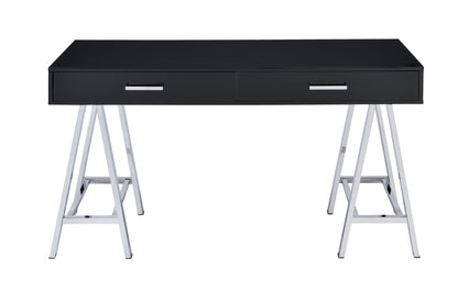 The Coleen - High Gloss Writing Desk With USB features a modern black finish, two drawers, and chrome metal trestle-style legs, shown against a white background.