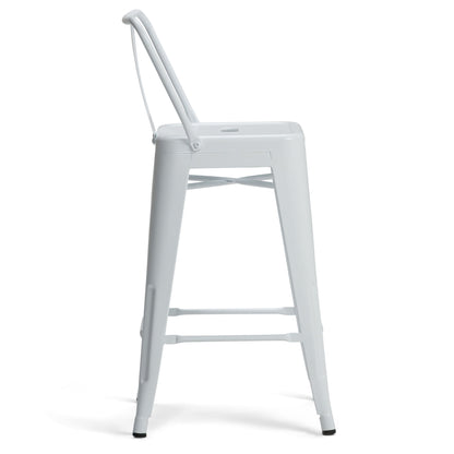 The Rayne - Multifunctional Metal Stool is shown in profile against a white background. It features a white metal frame, low backrest, four straight legs with black tips, footrests, and a modern minimalist design.