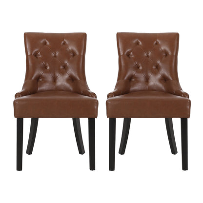The Cheney Contemporary Dining Chair set features two brown, tufted leather chairs with black wooden legs, placed side by side and facing forward against a plain white background.