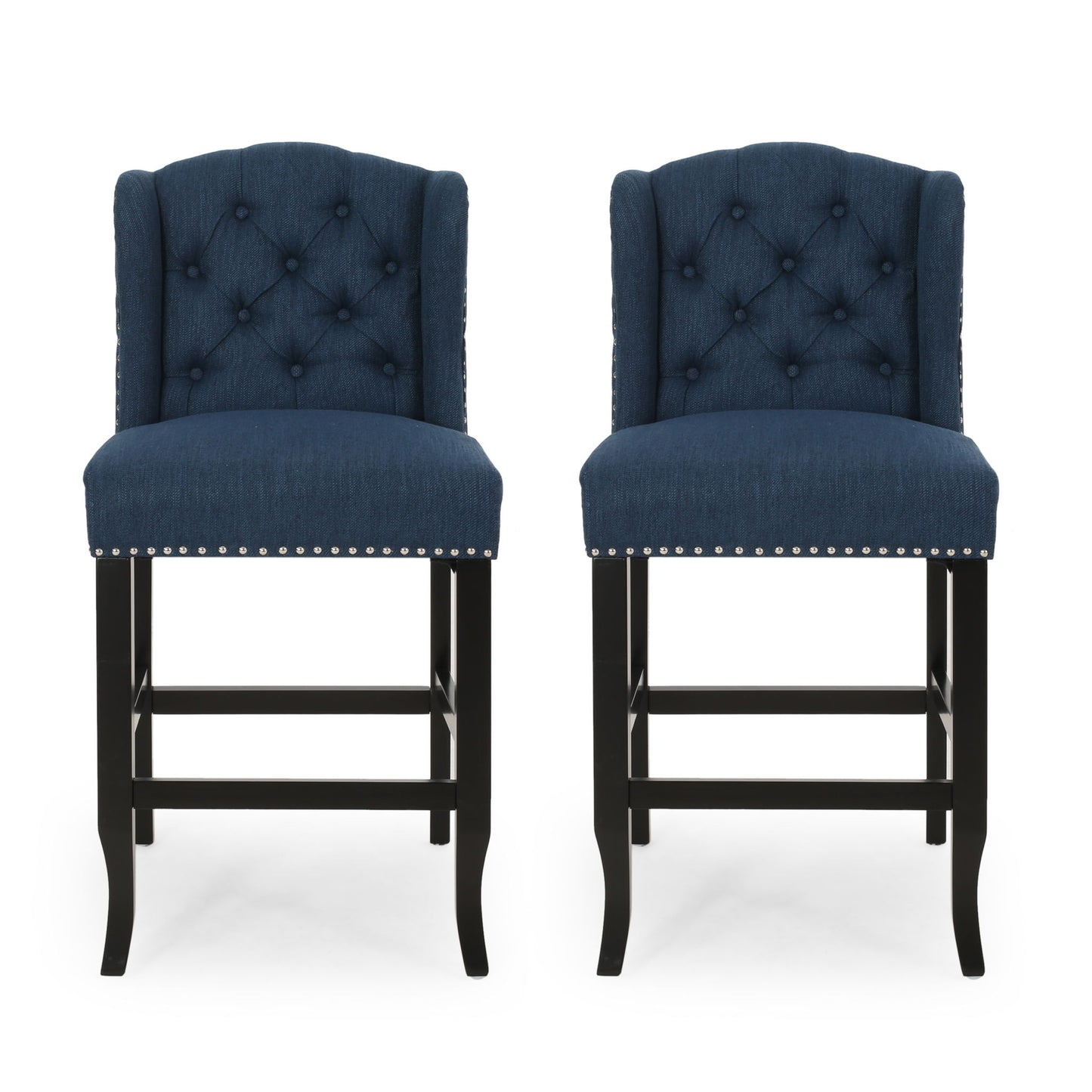 The Vienna Fabric Tufted Counter Stool With Nailhead Accents (Set of 2) features navy blue upholstery, button-tufted backs, silver nailhead trim, and dark wooden legs, shown side by side against a white background.