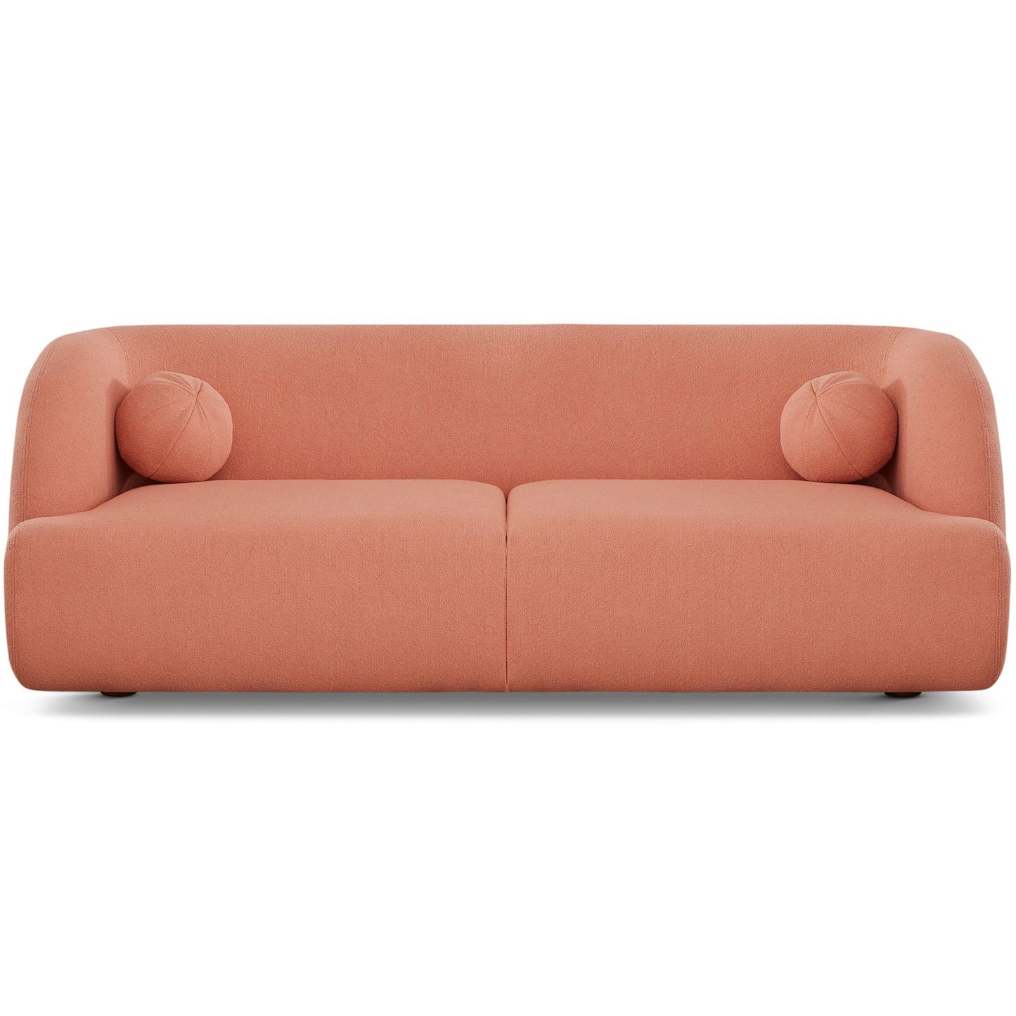The Anna - French Boucle Sofa is a modern, minimalist piece in muted pink with smooth rounded edges and two matching cylindrical bolster pillows at each end.