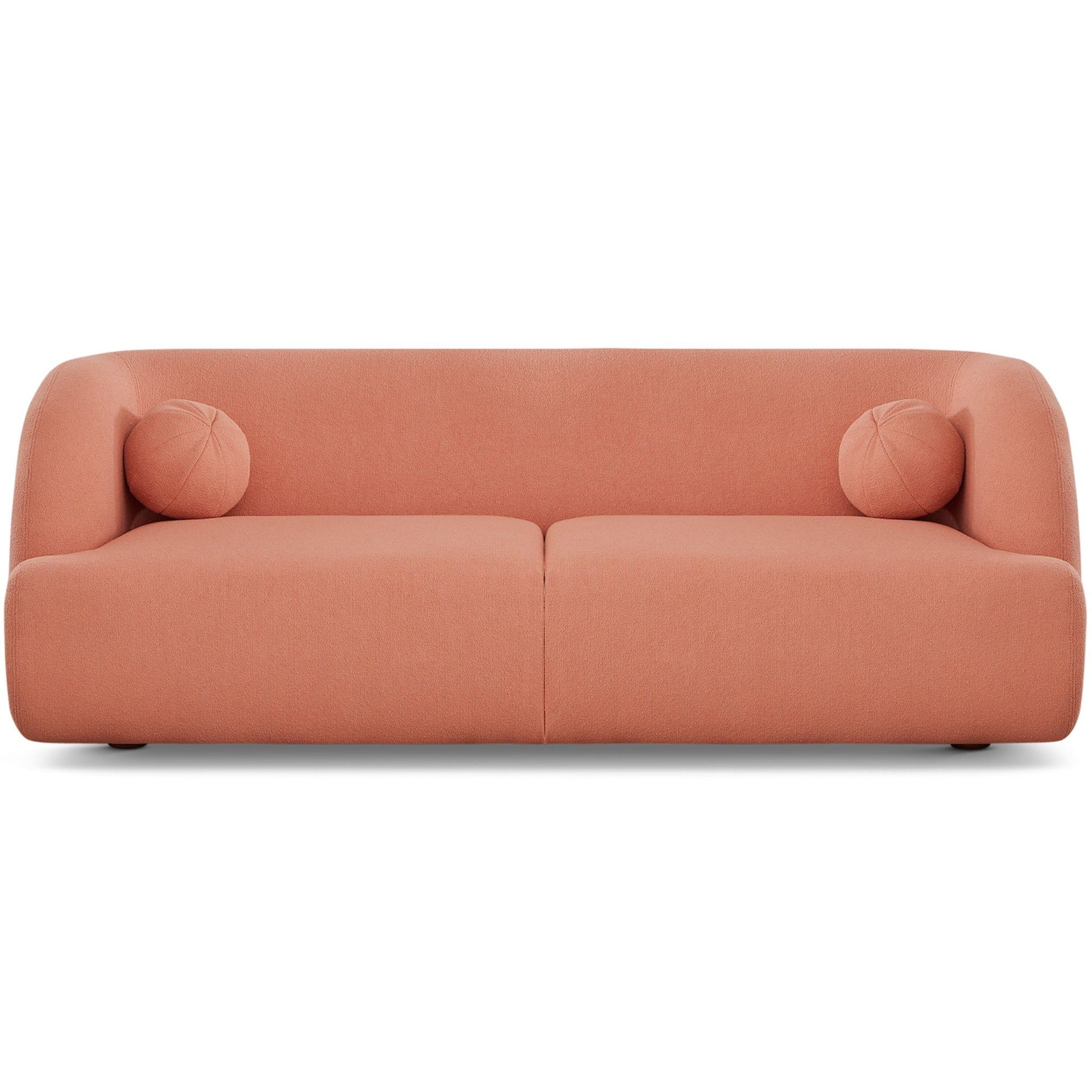 The Anna - French Boucle Sofa is a modern, minimalist piece in muted pink with smooth rounded edges and two matching cylindrical bolster pillows at each end.