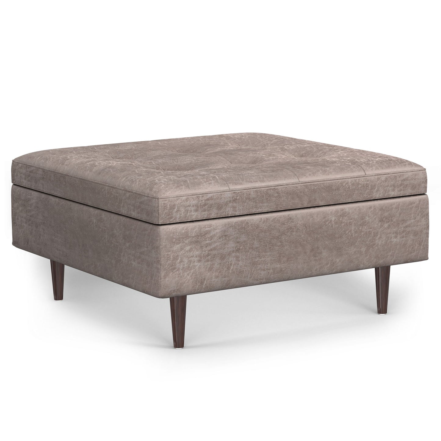 The Shay Large Square Coffee Table Storage Ottoman features a light brown upholstery, short tapered wooden legs, and a modern mid-century design.