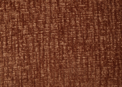 The Carrick Sandwich Mesh Ottoman features rustic brown textured fabric with a soft, velvety feel and an irregular pattern, giving it a subtly worn, vintage look with varying brown shades.