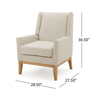 The Modern Accent Chair With Padded Cushion Seat features beige upholstery, wooden legs, and cushioned seat and back. Dimensions: 36.5" tall, 28.5" wide, 27.5" deep.