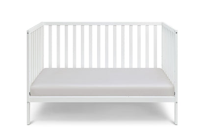 The Palmer - 3-in-1 Convertible Island Crib is a white crib with open sides and slatted back rails, shown with a plain light gray mattress against a white background.