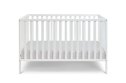 The Palmer - 3-in-1 Convertible Island Crib features vertical slats on all four sides and a fitted mattress. With its simple, modern design, this white crib is shown against a plain white background.