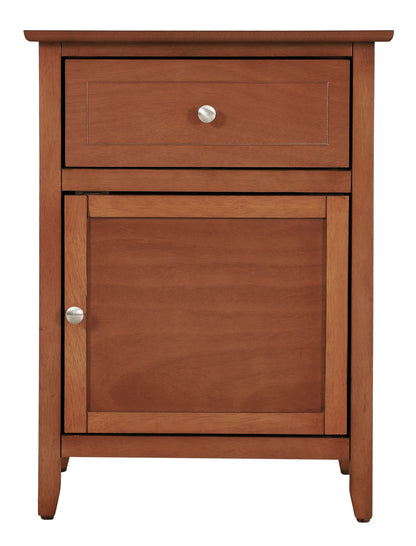 The Izzy 1 Drawer/1 Door Nightstand is a wooden cabinet with a top drawer and a lower door featuring a round knob, all in a medium brown finish and classic, simple design.