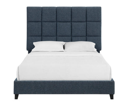 The Squares Upholstered Platform Bed features a tall, dark blue, square-tiled headboard, white bedding, and two white pillows, displayed against a plain white background.