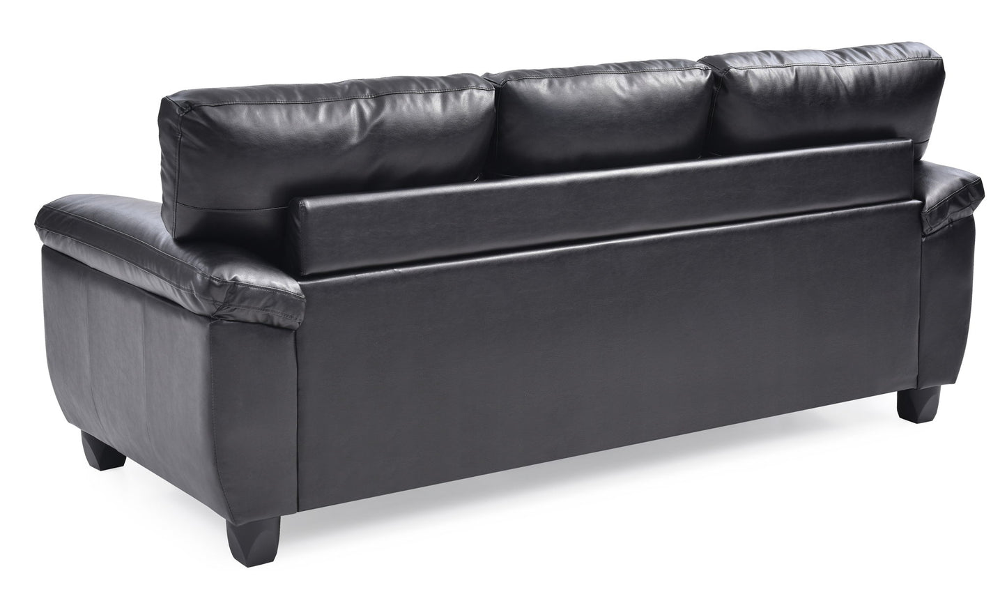 The Comfortable Sofa features black leather, three back cushions, wide armrests, and short square legs, as seen from the back.