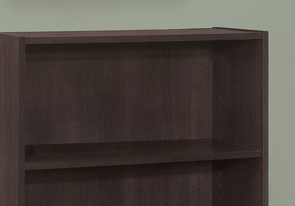 A close-up of an empty dark brown 4-tier transitional bookshelf, ideal for office use, placed against a plain light green wall.