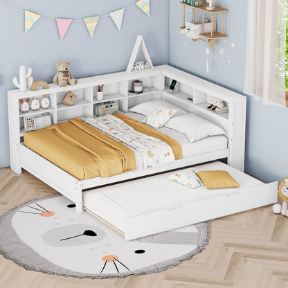 A cozy kids’ bedroom with the Wooden Full Size Daybed With Twin Size Trundle, featuring built-in shelves, USB ports, white finish, mustard yellow bedding, stuffed animals, books, and playful decor against pastel blue walls.