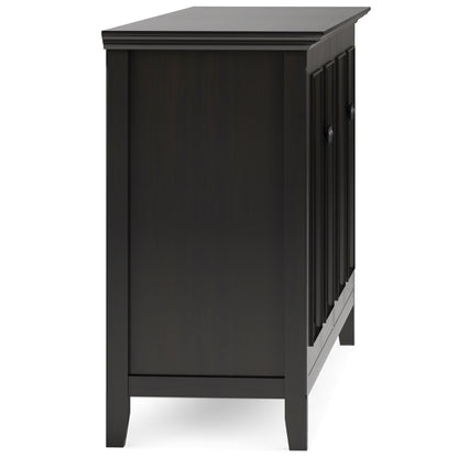 A side view of the Amherst Wide 4 Door Storage Cabinet in Hickory Brown, featuring a flat top, paneled doors, four legs, and a simple modern design with clean lines and a rich dark finish.