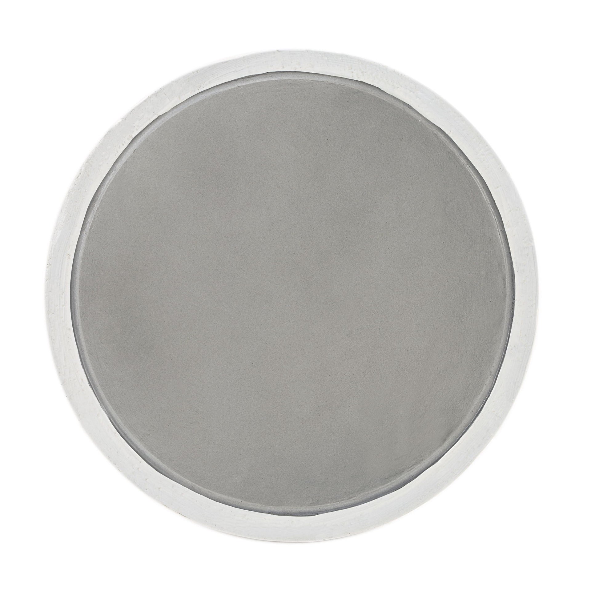 A round, flat gray surface with a slightly raised white edge, resembling the top of the Dylana Natural Fiber Concrete Accent Table in Gray when viewed from above.