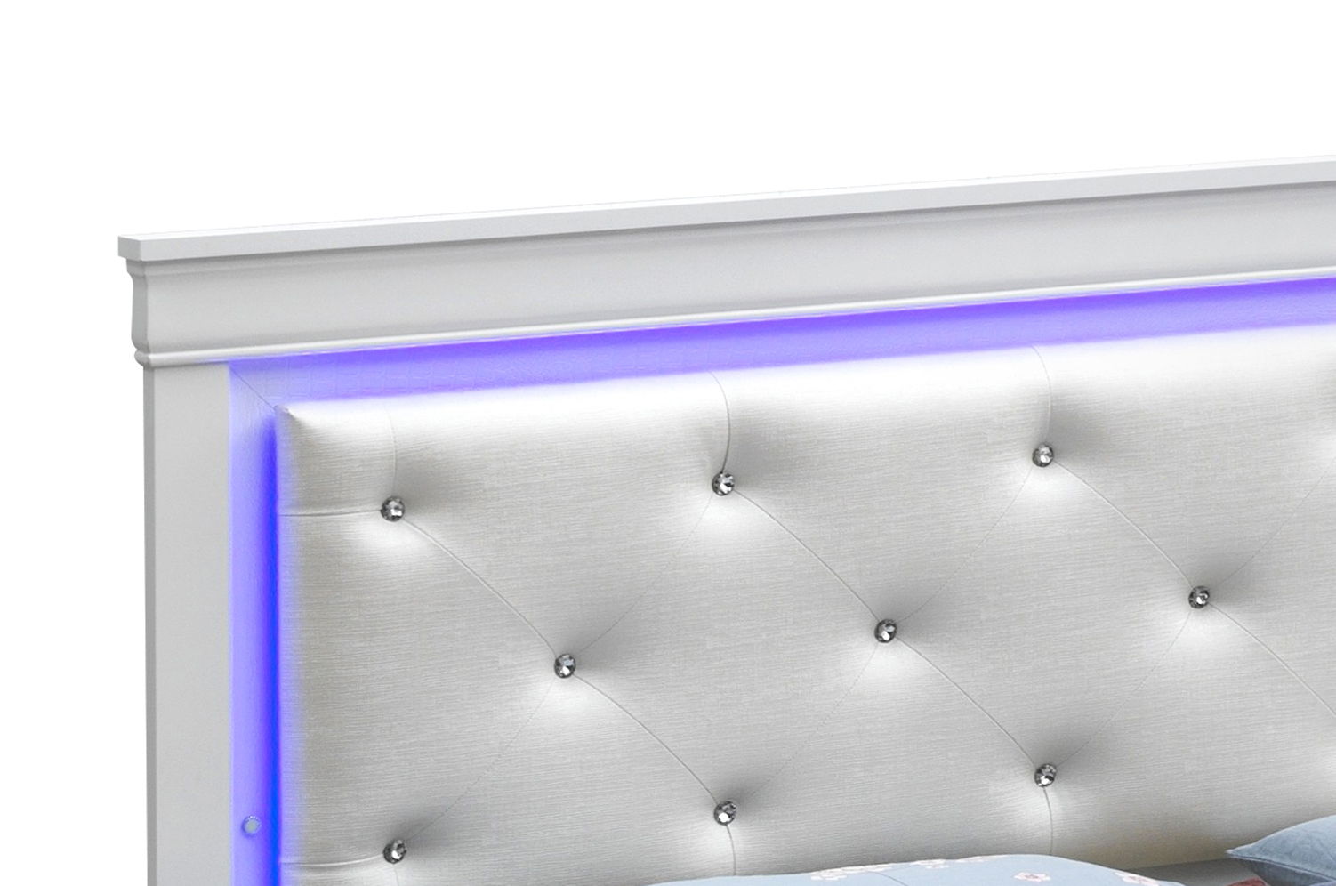The Lorana - G6590C-FB3 Full Bed in Silver Champagne features a white tufted faux leather headboard with crystal-like buttons and a soft blue LED light strip along the top edge. The bed's lower portion is partially visible in the image.