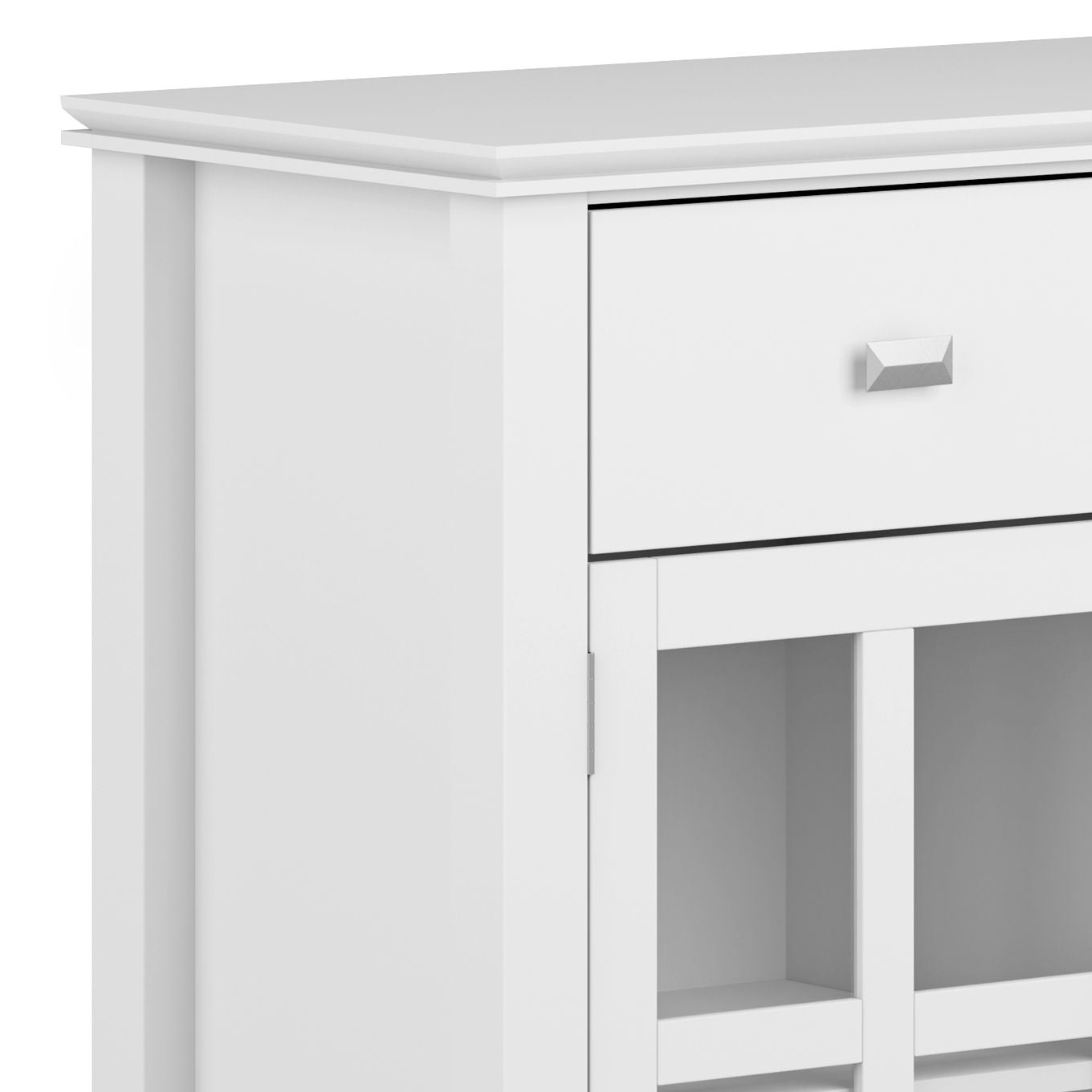 Close-up of the Artisan - Handcrafted Sideboard Buffet, a white wooden cabinet with a single silver-handled drawer and an open lower shelf featuring vertical and horizontal dividers.