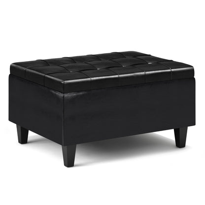 The Harrison Upholstered Coffee Table Storage Ottoman features a black, rectangular design with a tufted cushioned top and short angled legs, shown against a white background.