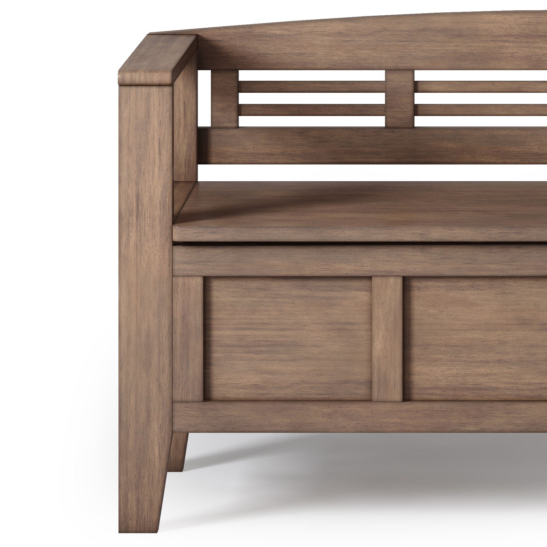 A close-up of the Adams Entryway Storage Bench in Rustic Natural Aged Brown shows the left side with a backrest featuring horizontal slats and a solid rectangular panel below the seat. The wood has a warm, medium brown finish.