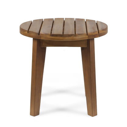 The Outdoor Acacia Wood Side Table features a small, round slatted top and three angled legs, crafted from weather-resistant acacia wood and displayed on a white background.