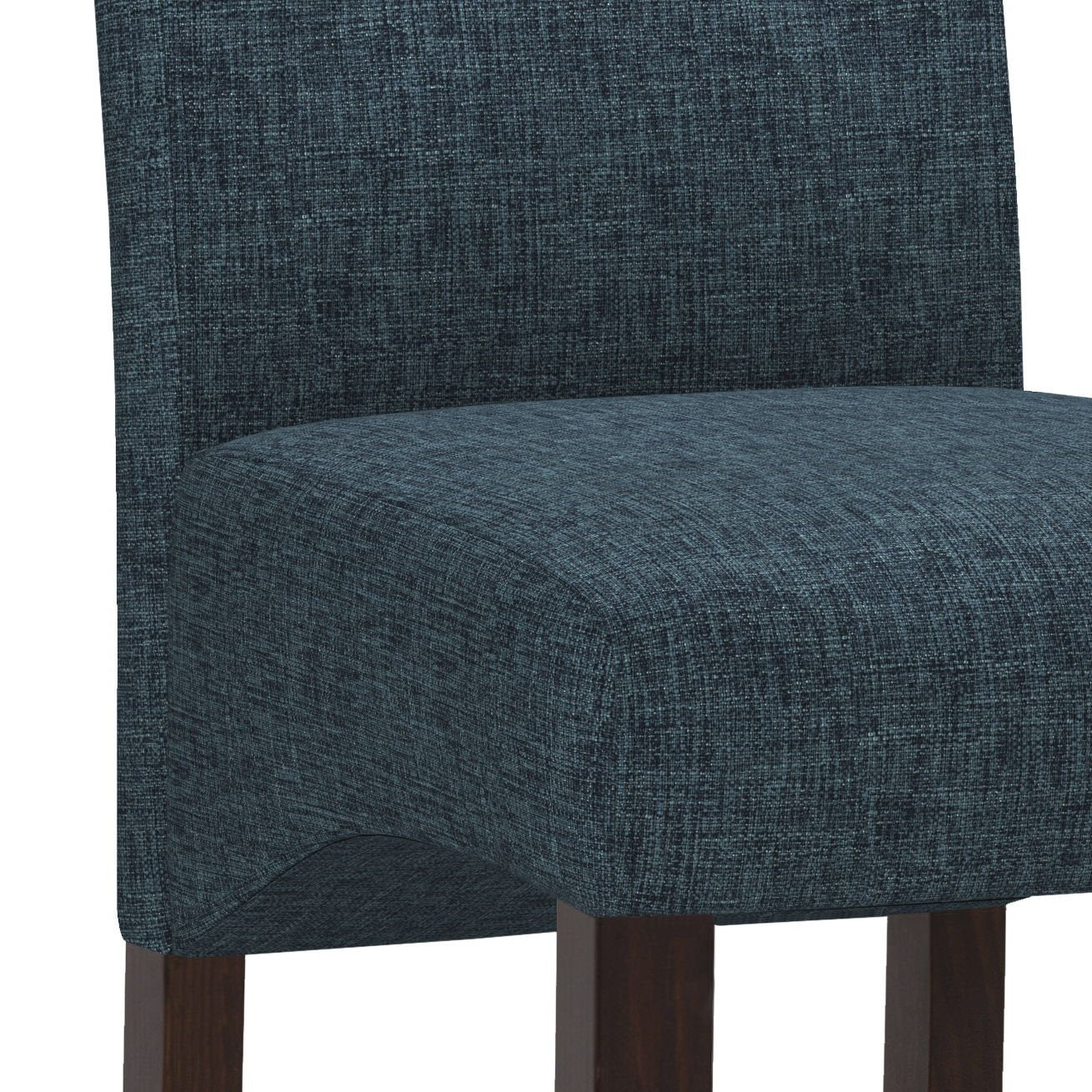 A close-up of the Cosmopolitan - Deluxe Tufted Parson Upholstered Chair (Set of 2) featuring dark blue textured fabric and dark wooden legs.