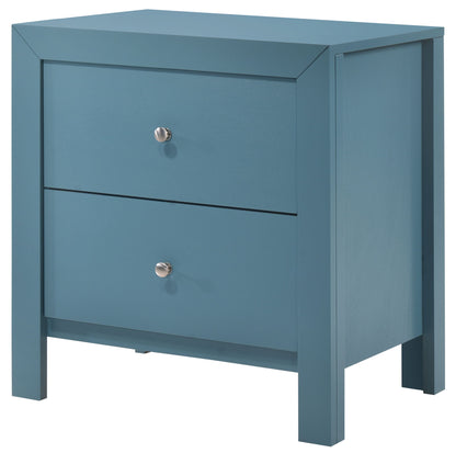 The Charming Nightstand With Drawers is a blue wooden piece featuring two drawers with round silver knobs, showcasing a simple modern design, clean lines, and a matte finish.