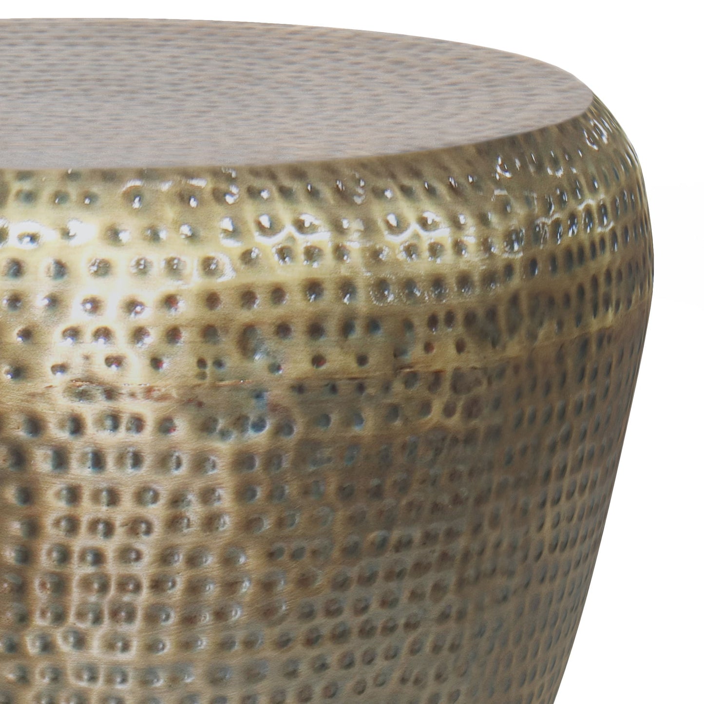 Close-up of the Preston Handcrafted Metal Side Table reveals its rounded, dimpled surface with a shiny, reflective finish in rich bronze and gold tones.