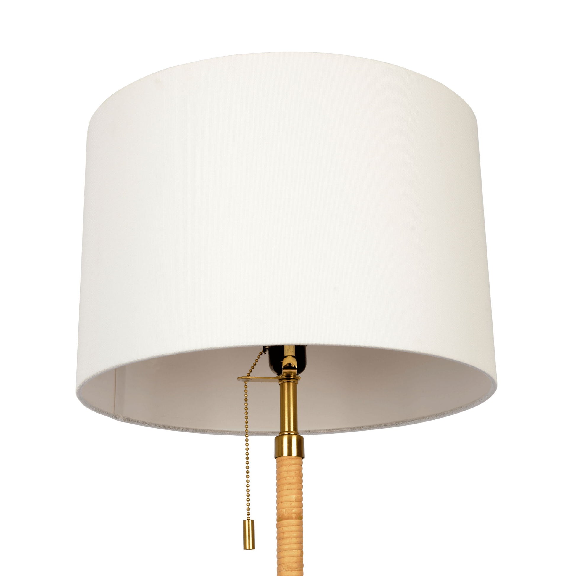 The Stellar Linen Shade Floor Lamp features a large white cylindrical shade, gold accents, a pull chain switch, and a natural wood and rattan-wrapped stem.