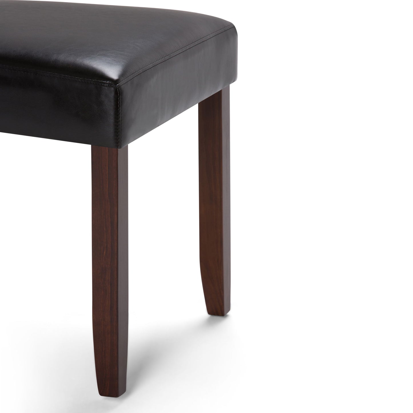 A close-up of the Acadian - Upholstered Parson Dining Chair (Set of 2), featuring a black leather seat and dark wooden legs, shown on a white background.