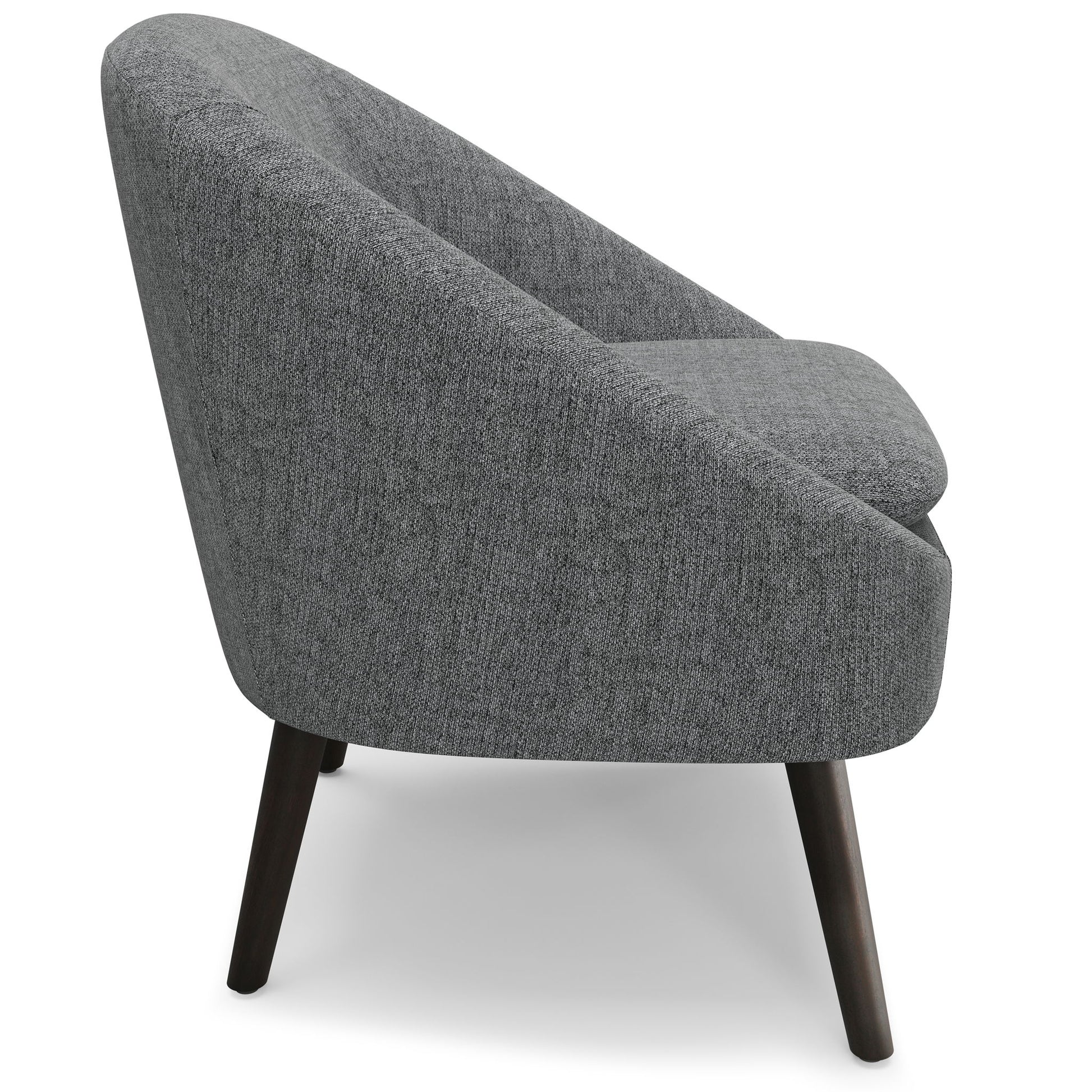 The Redding - Upholstered Accent Chair features a modern gray design with a rounded backrest and dark wooden legs, displayed from a side angle against a white background.