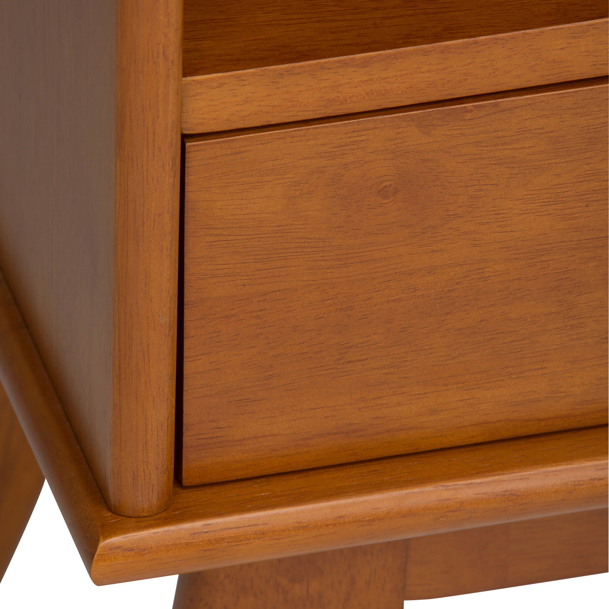 Close-up of the Draper Mid Century Wide Bookcase and Storage Unit, featuring a smooth warm brown finish, part of a storage drawer, and angled legs with rounded edges in a simple modern design.