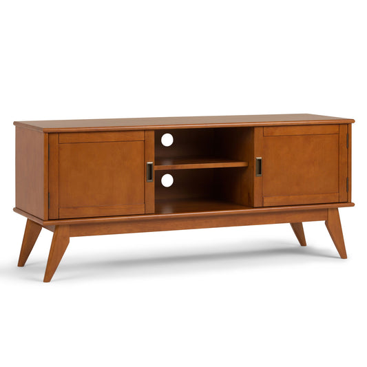 The Draper Handcrafted Mid Century Low TV Media Stand features angled legs, two sliding doors, an open center with two shelves, and dual circular cable management holes at the back.