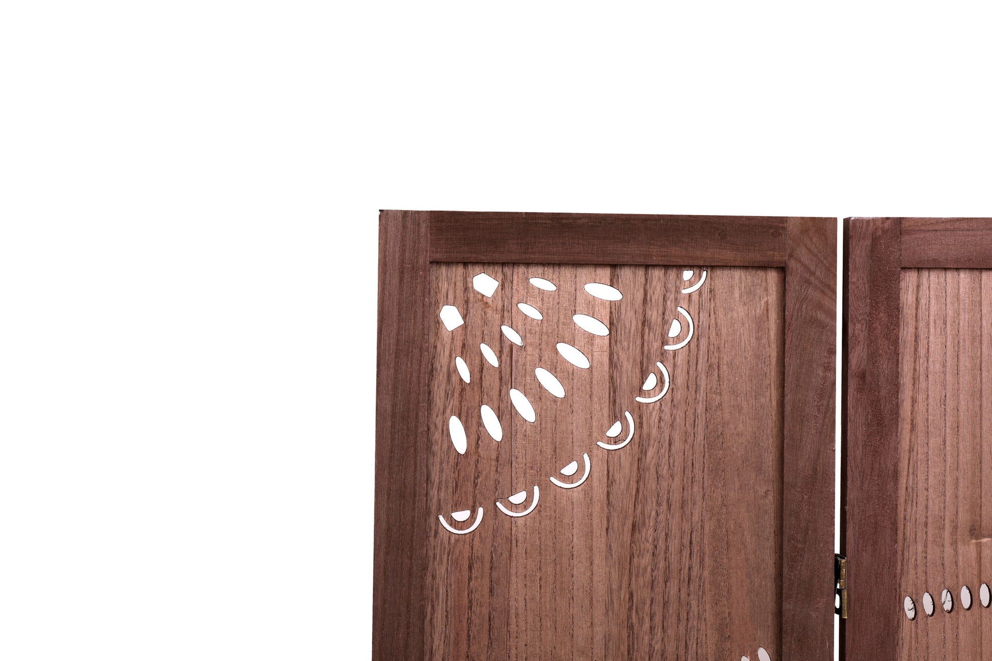 A close-up of the Panel Solid Wood Folding Room Divider with decorative cut-out patterns of ovals and half-circles, set against a plain white background.