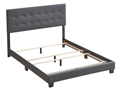 The Caldwell Bed features a tall, tufted, dark gray upholstered headboard and sturdy wooden slats. Shown without a mattress for a modern look.