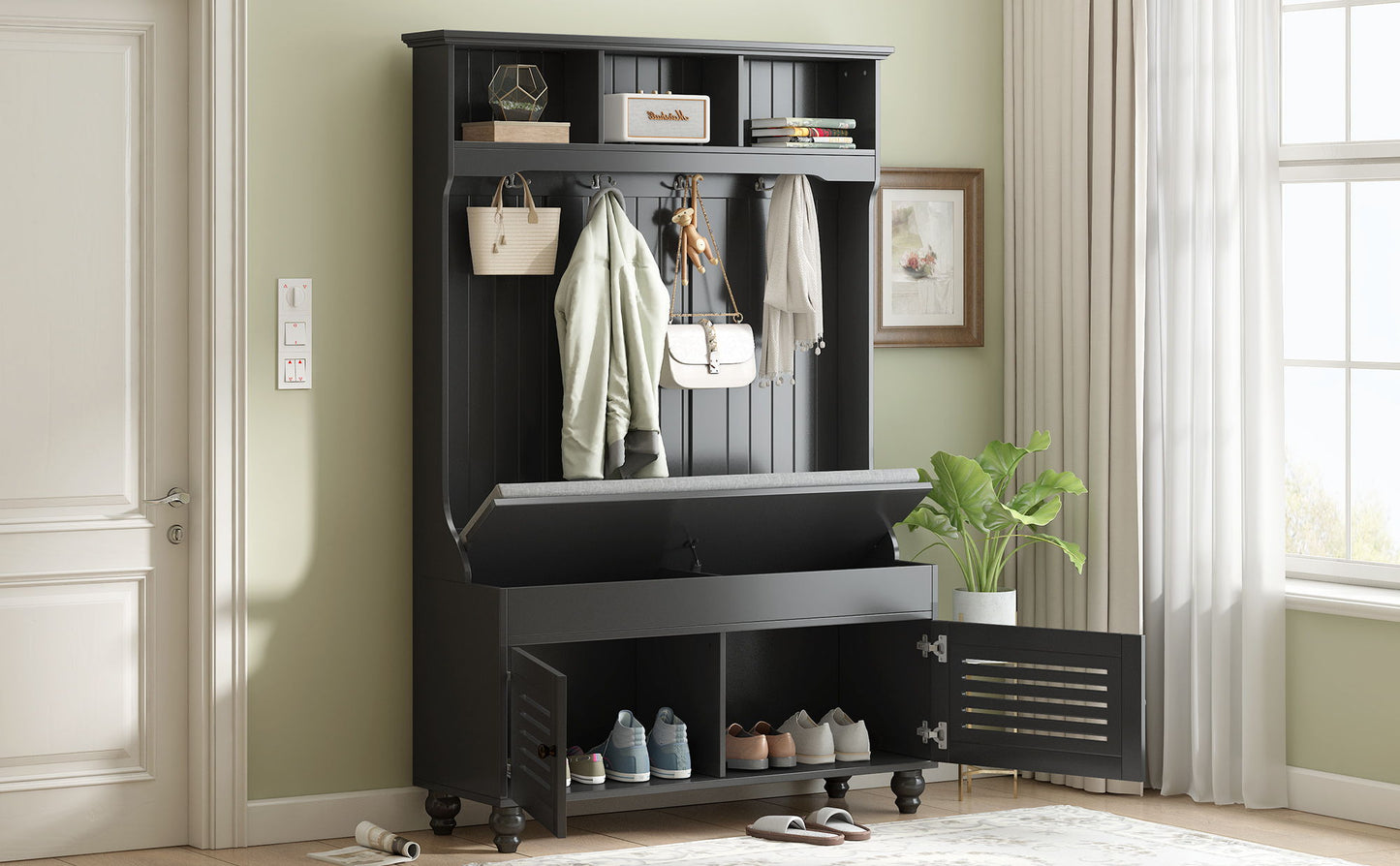 The 5 In 1 Entryway Bench features shutter-shaped doors, a cushioned seat, 4 sturdy hooks for coats and bags, ample storage, and a wide hall tree design—perfect for entryways or living rooms. Decorate with plants and art beside white-curtained windows.