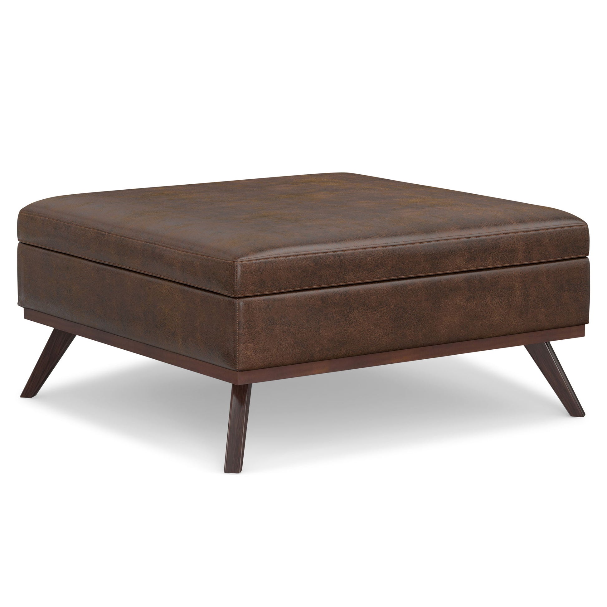 The Owen Multifunctional Square Coffee Table Storage Ottoman features brown leather upholstery, angled wooden legs, a cushioned top, and a modern minimalist design.