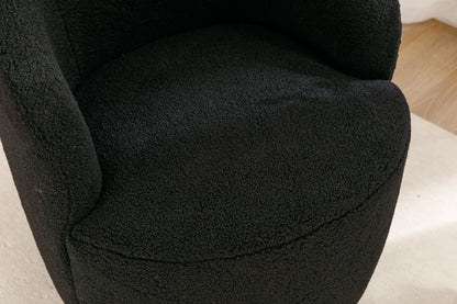 Close-up of the Teddy Fabric Swivel Accent Armchair Barrel Chair, featuring black textured upholstery, curved armrests, a rounded seat, and a powder-coated metal ring base on a light-colored floor.
