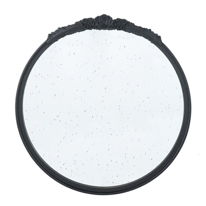 The Round Hand Carved Rose Antique Mirror Frame is a vintage-style wall mirror with a black ornate floral top and speckled antique glass, shown on a plain white background.