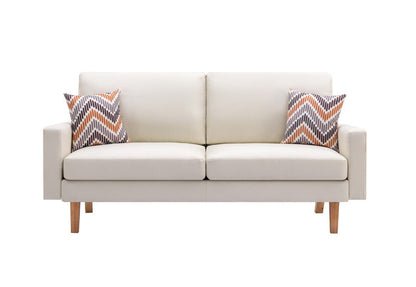 The Bahamas Minimalistic Sofa in modern white, with wooden legs, includes two patterned throw pillows in orange, brown, and gray on each end. Set against a white background.