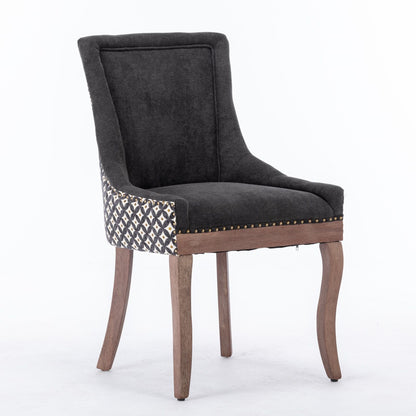 The Ultra Side Dining Chair features thickened neutral fabric, solid wood legs, patterned upholstery on the sides and back, and a bronze nailhead trim along the front edge. Set of 2.