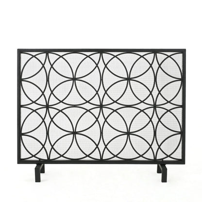 The Thayer Single Panel Iron Fireplace Screen features a geometric design with intersecting circles, a rectangular black frame, and stands on four short legs against a white background.